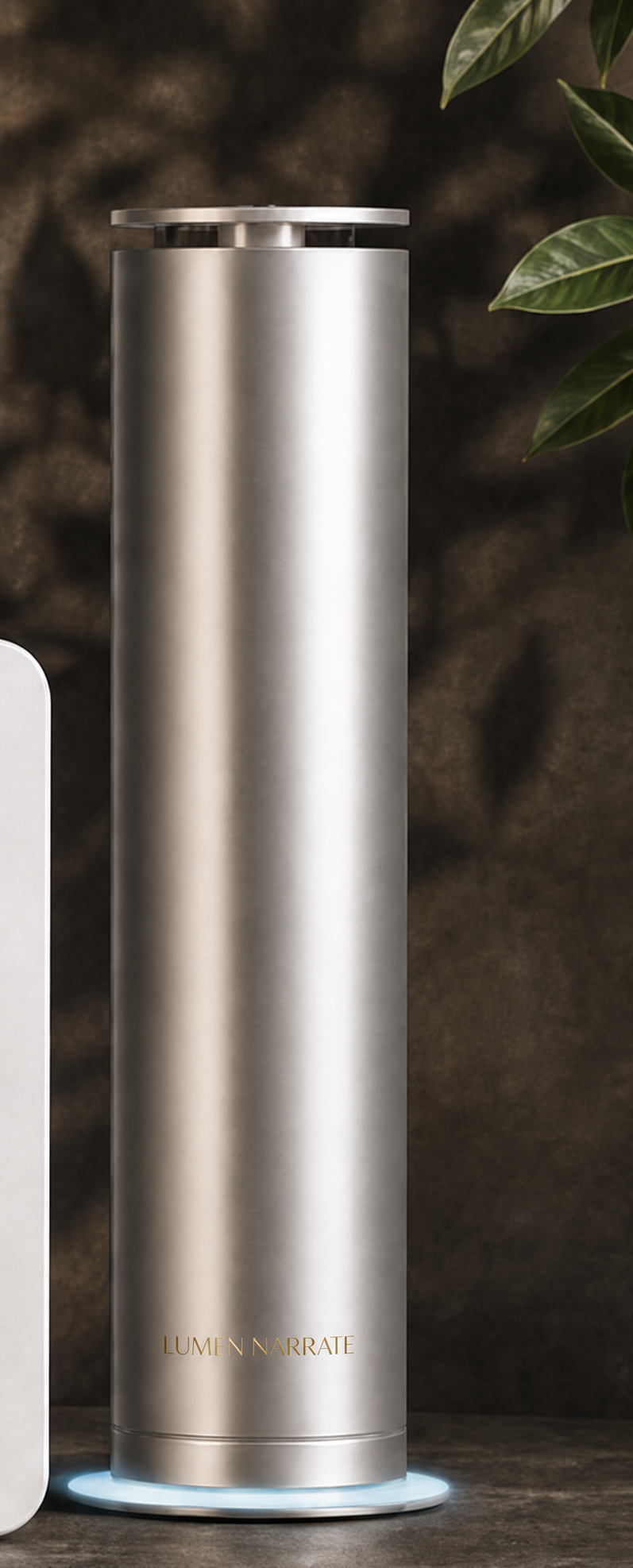 RA01 silver scent machine with a gold LUMEN NARRATE logo